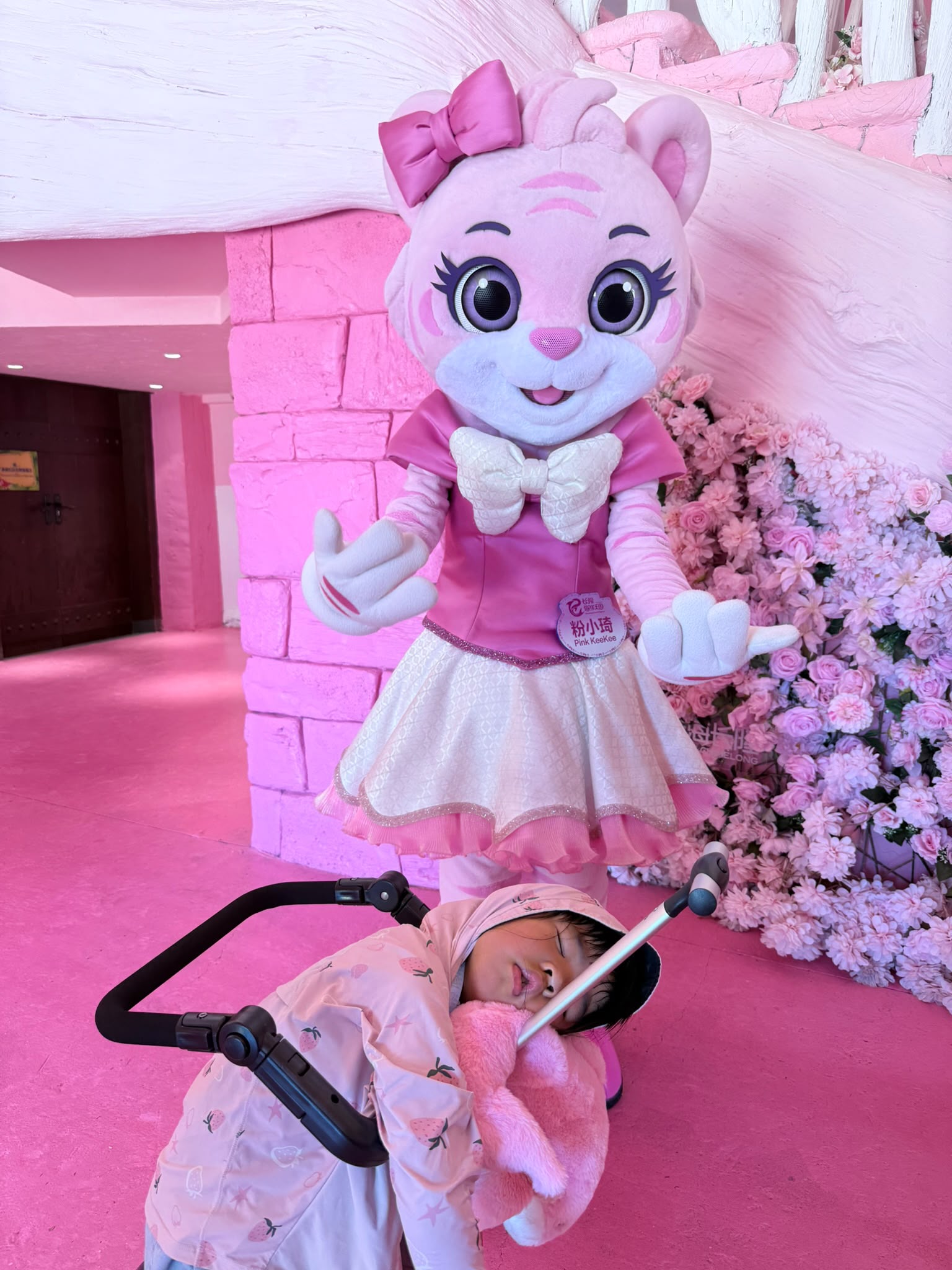 Our little one napping on the ride-on luggage during a trip